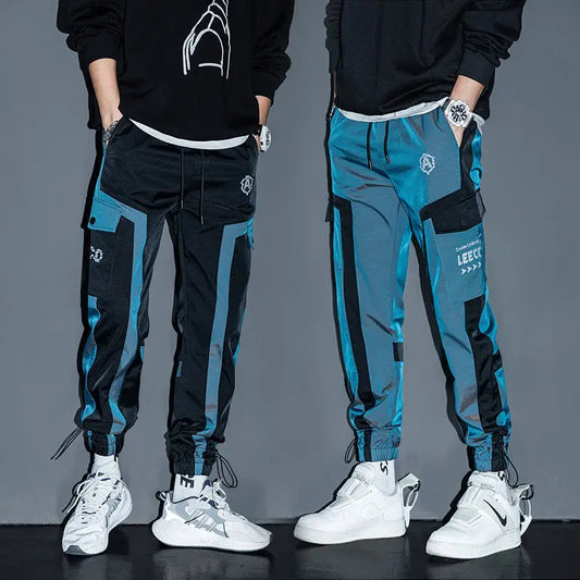 Pantalon de jogging hip-hop streetwear pour hommes, pantalon cargo décontracté pour étudiants, pantalon de rue haute taille élastique, pantalon sarouel ample au laser pour garçons