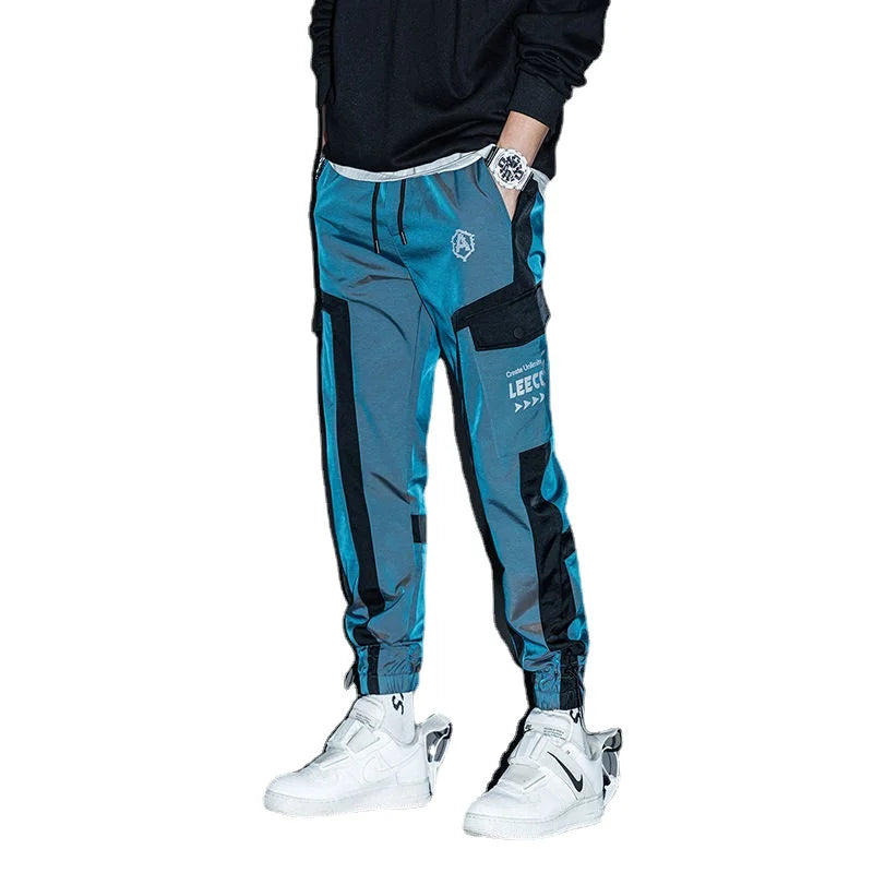 Pantalon de jogging hip-hop streetwear pour hommes, pantalon cargo décontracté pour étudiants, pantalon de rue haute taille élastique, pantalon sarouel ample au laser pour garçons